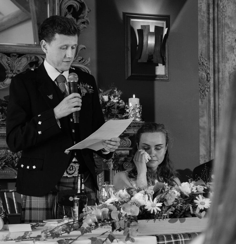 the bride cries as her husband delivers his speech