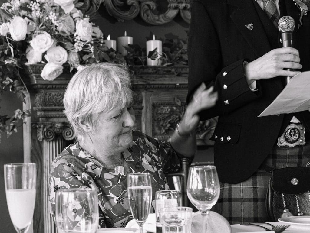 a touching moment between mum and her son as he gives his speech at Enterkine resort