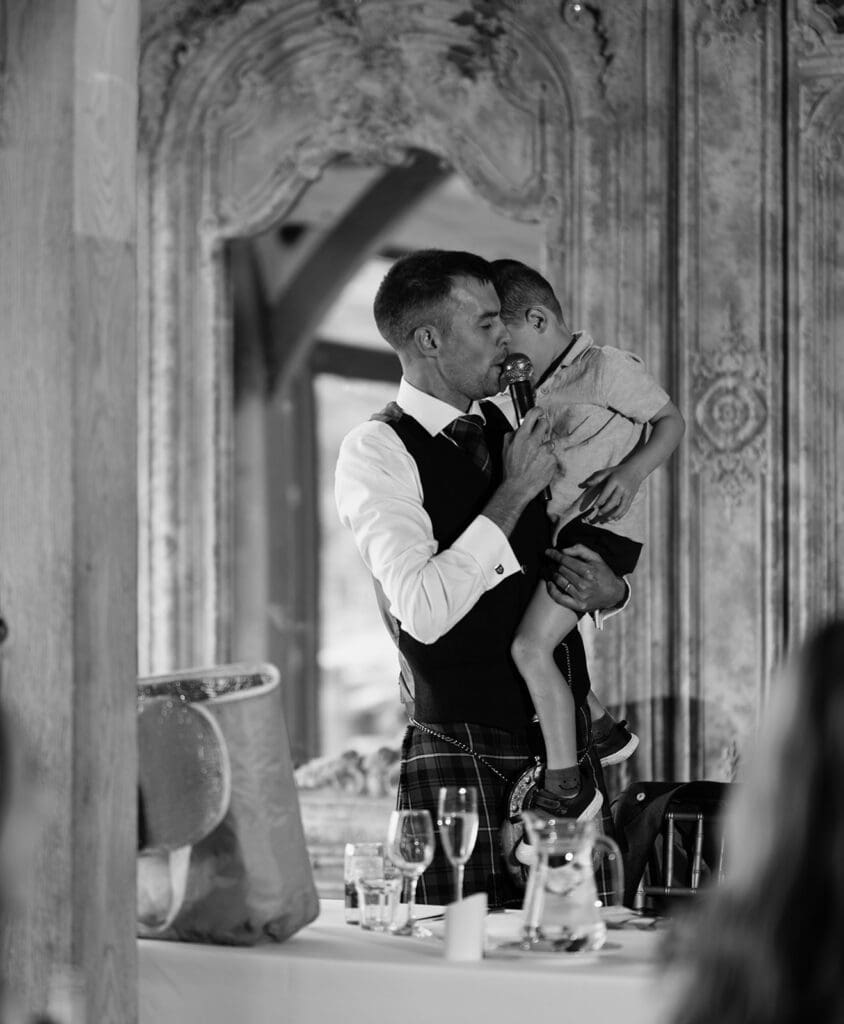The best man gives his speech with the help of his son, who is very shy