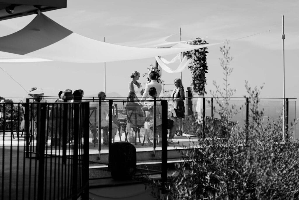 Wedding ceremony on sun drenched terraces of Villa Ricki, Sorrento, Italy