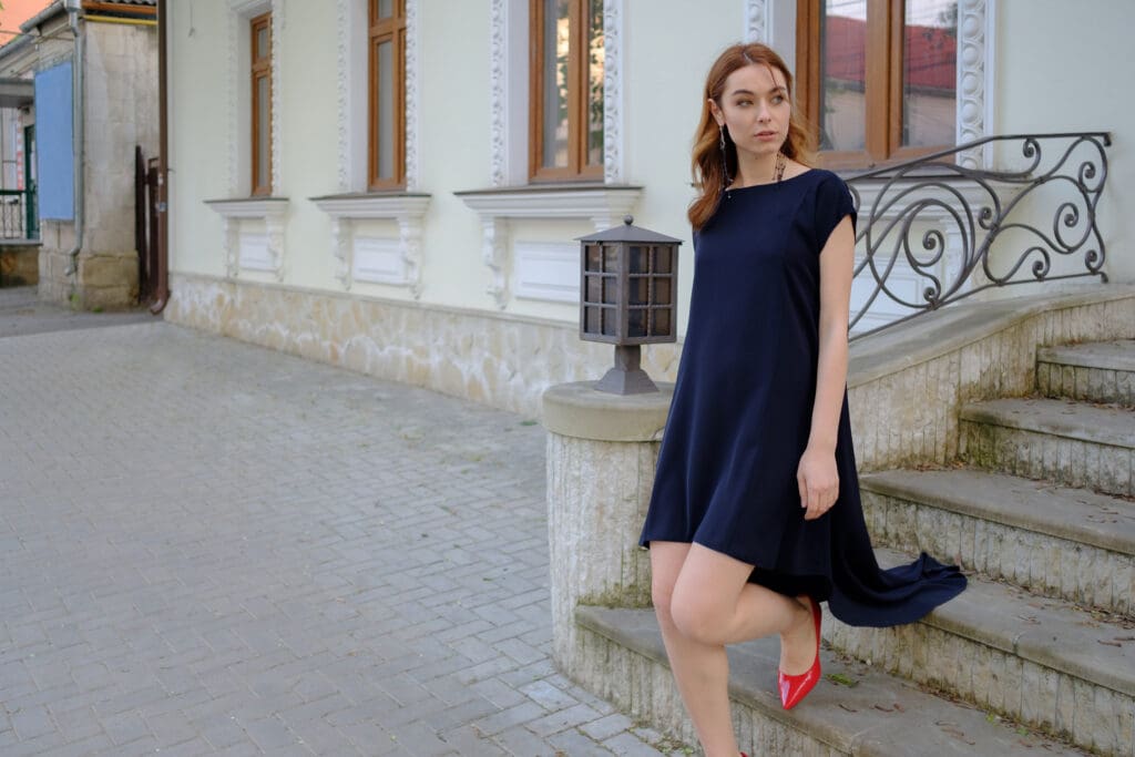 Confident woman in Glasgow city wedding wearing minimalist tailored dress