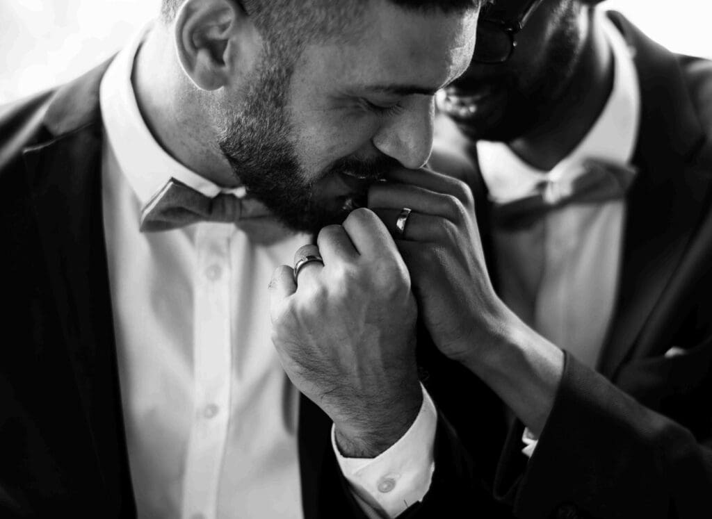 Groom and his best man get ready together for a city wedding in edinburgh, scotland