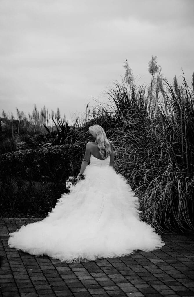 Bride and groom portraits at Seamill Hydro overlooking Arran