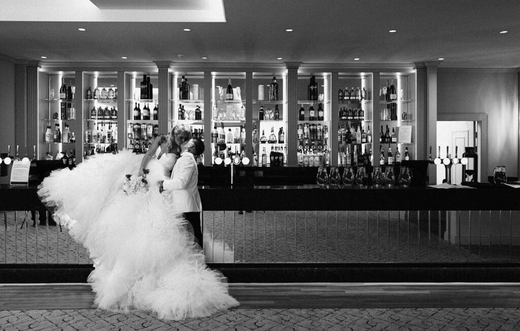Bride and groom portraits at Seamill Hydro overlooking Arran